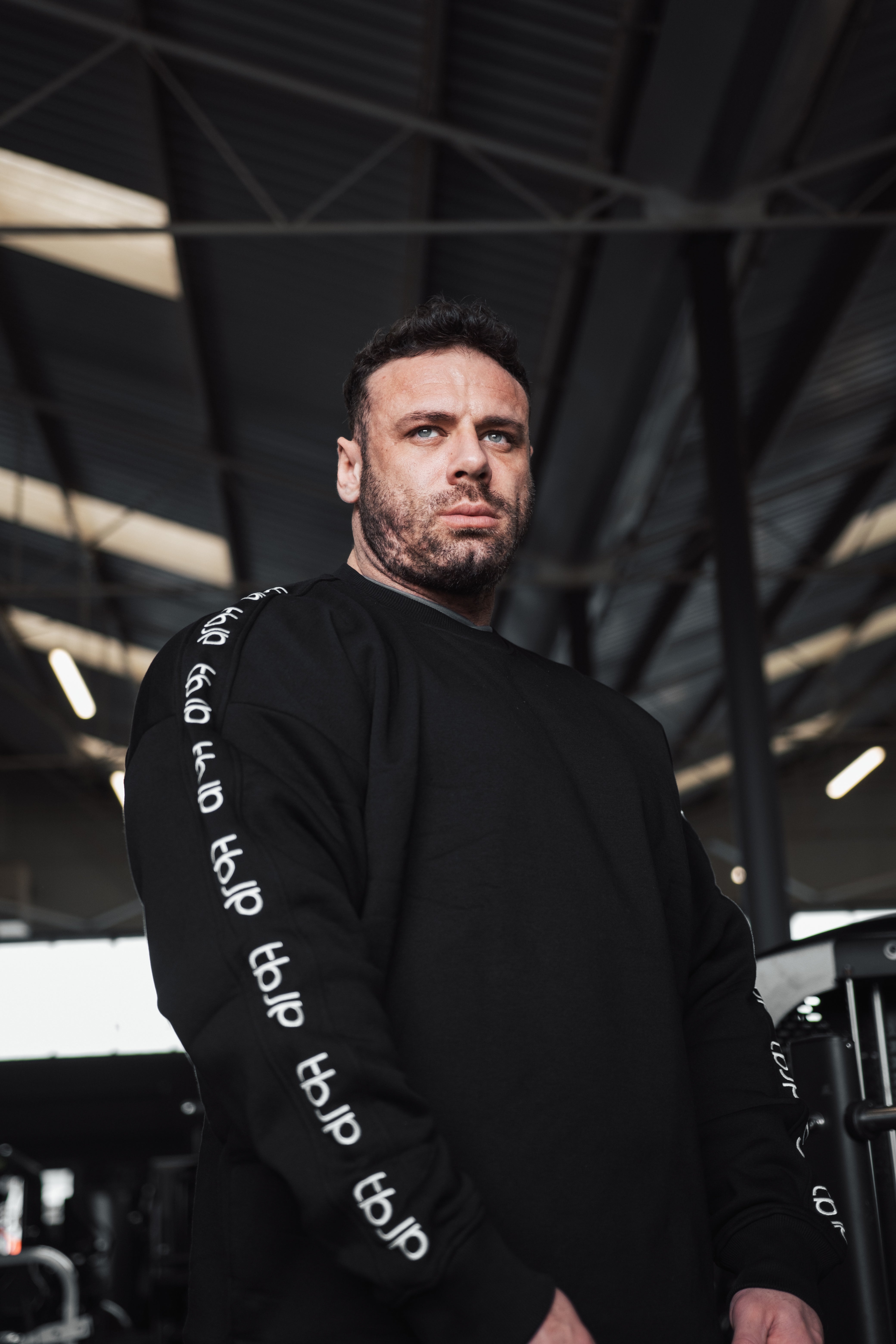 Black Sweater with Embroidered tbJP Arm Logo