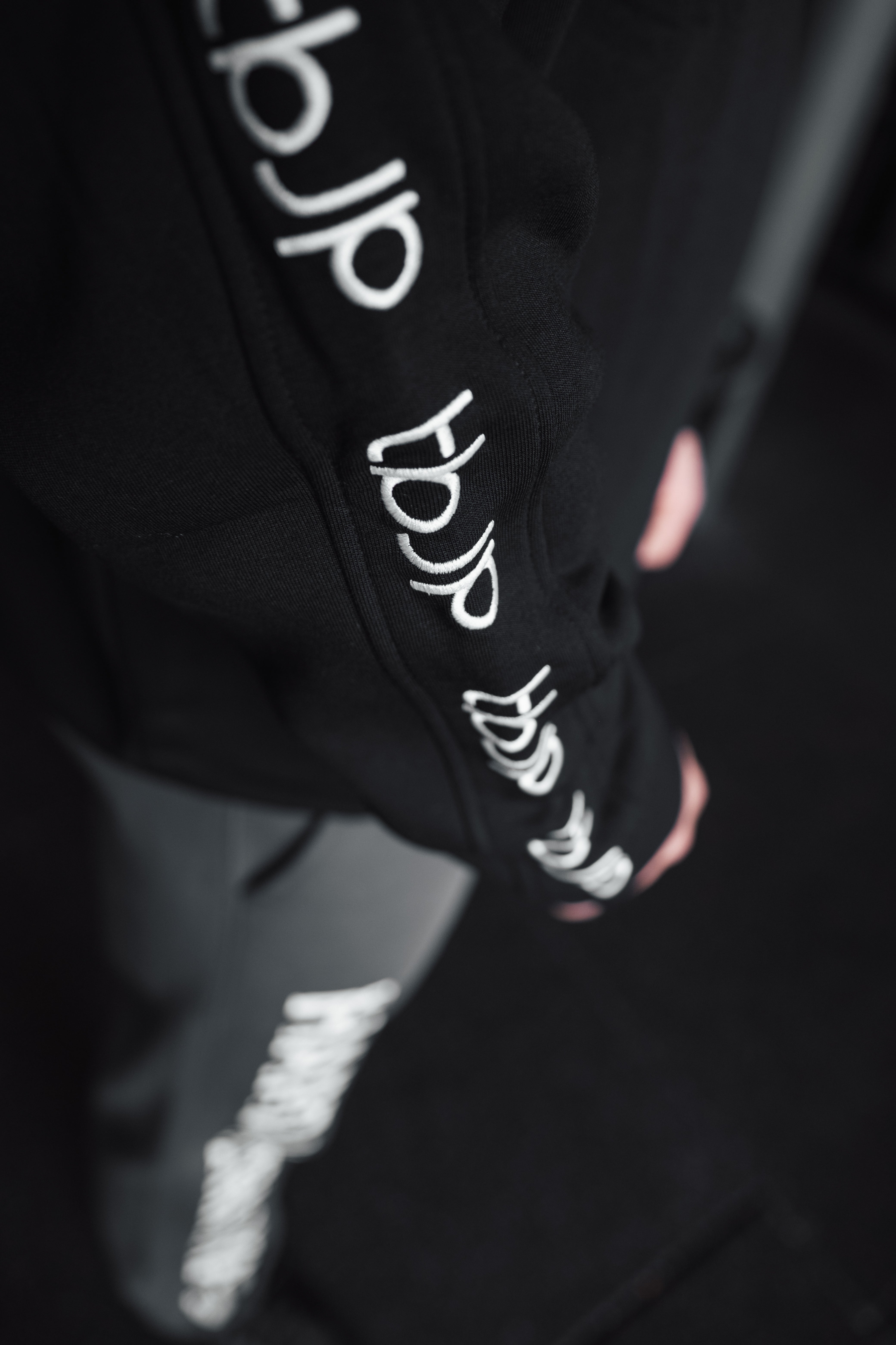Black Sweater with Embroidered tbJP Arm Logo