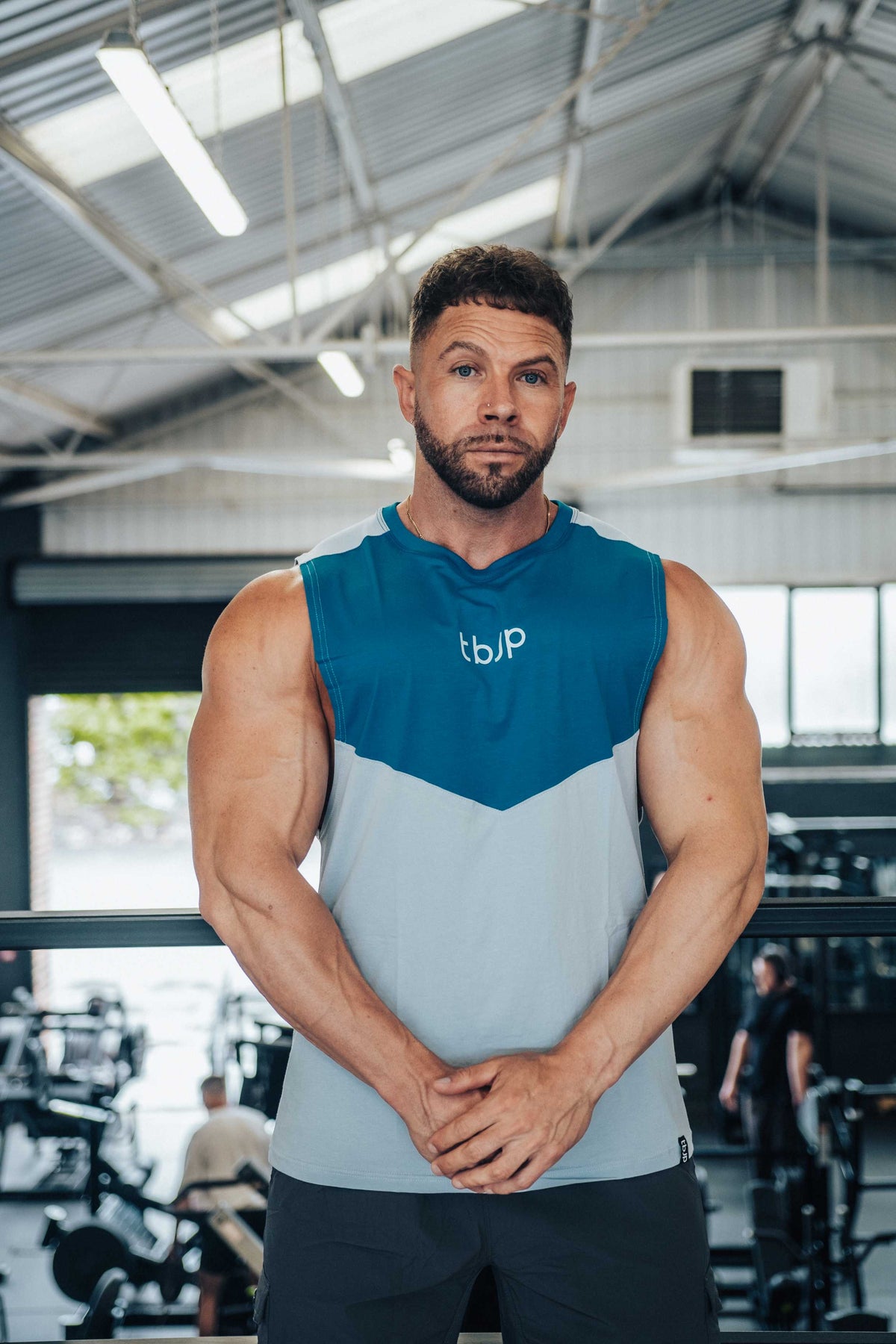Sleeveless Vest with vertical back stripe, in Baby Blue & Electric Blue