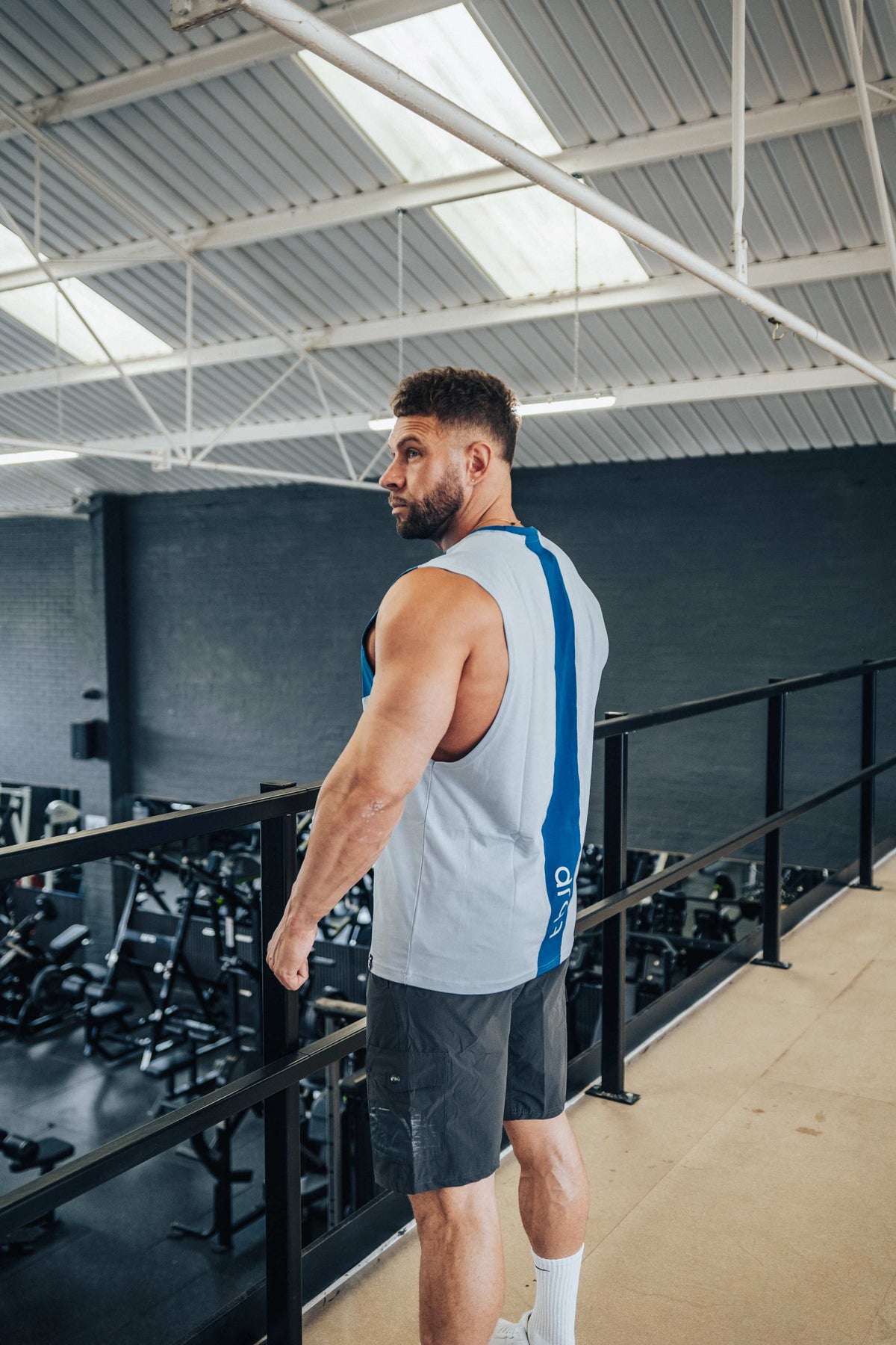 Sleeveless Vest with vertical back stripe, in Baby Blue & Electric Blue