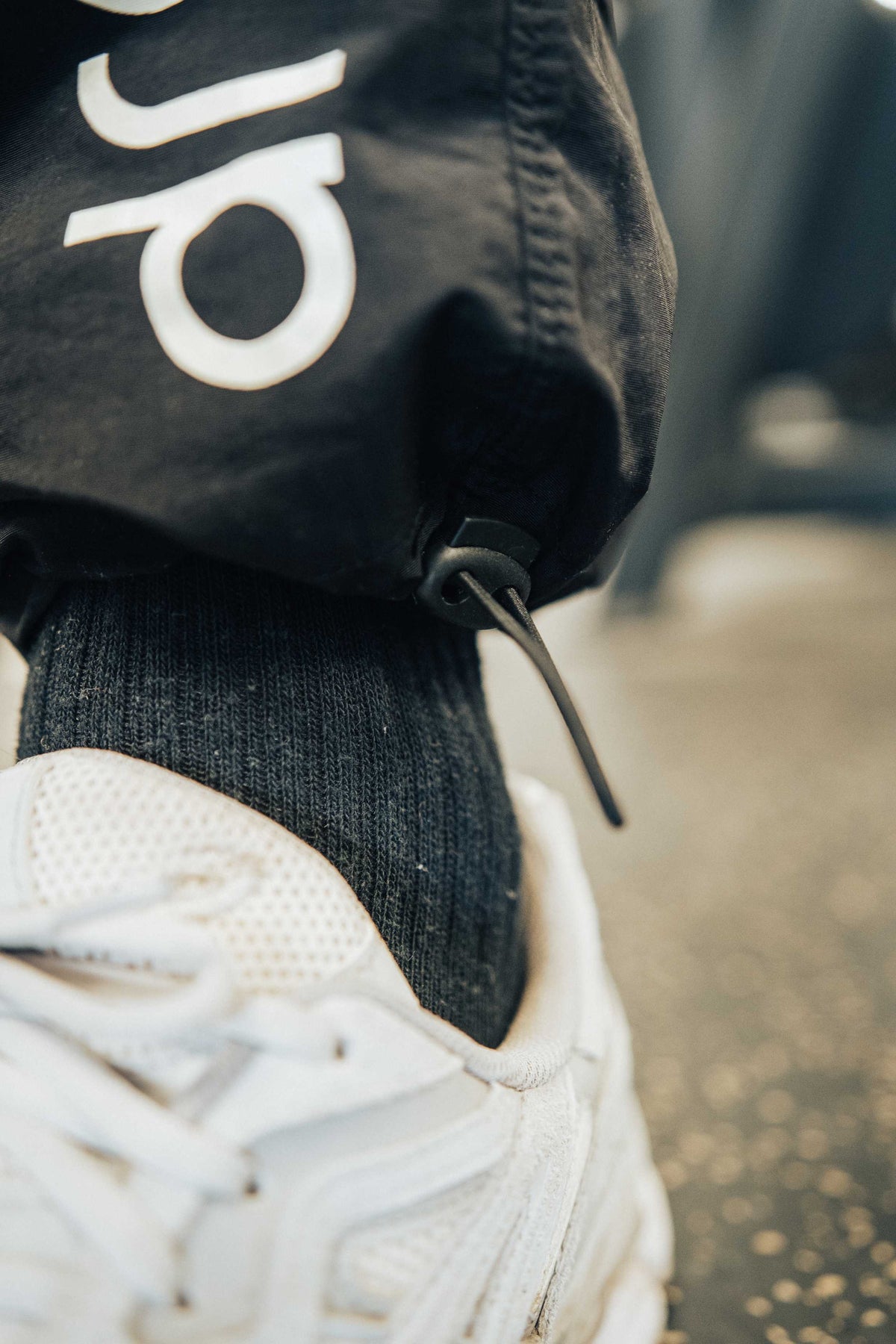Tapered Joggers with Drawstring cord cuffs in Black