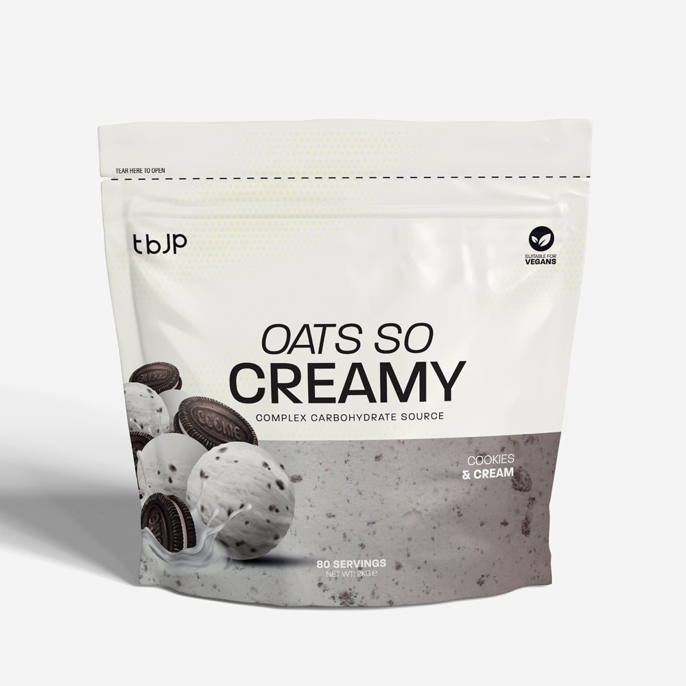 tBJP Oats So Creamy complex carbohydrate source in Cookies & Cream flavor, featuring a white and black design with a cookie graphic on the front.