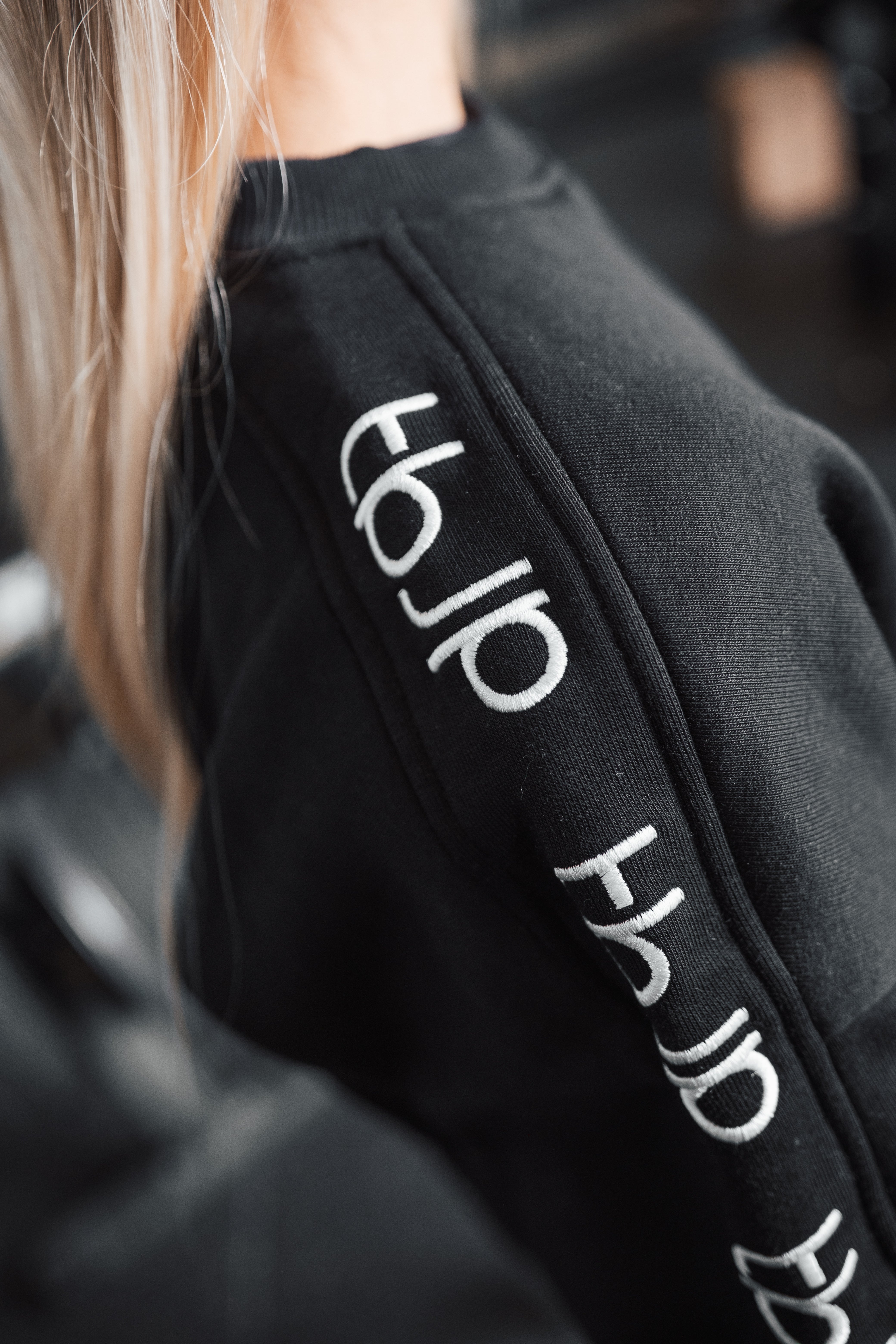 Black Sweater with Embroidered tbJP Arm Logo