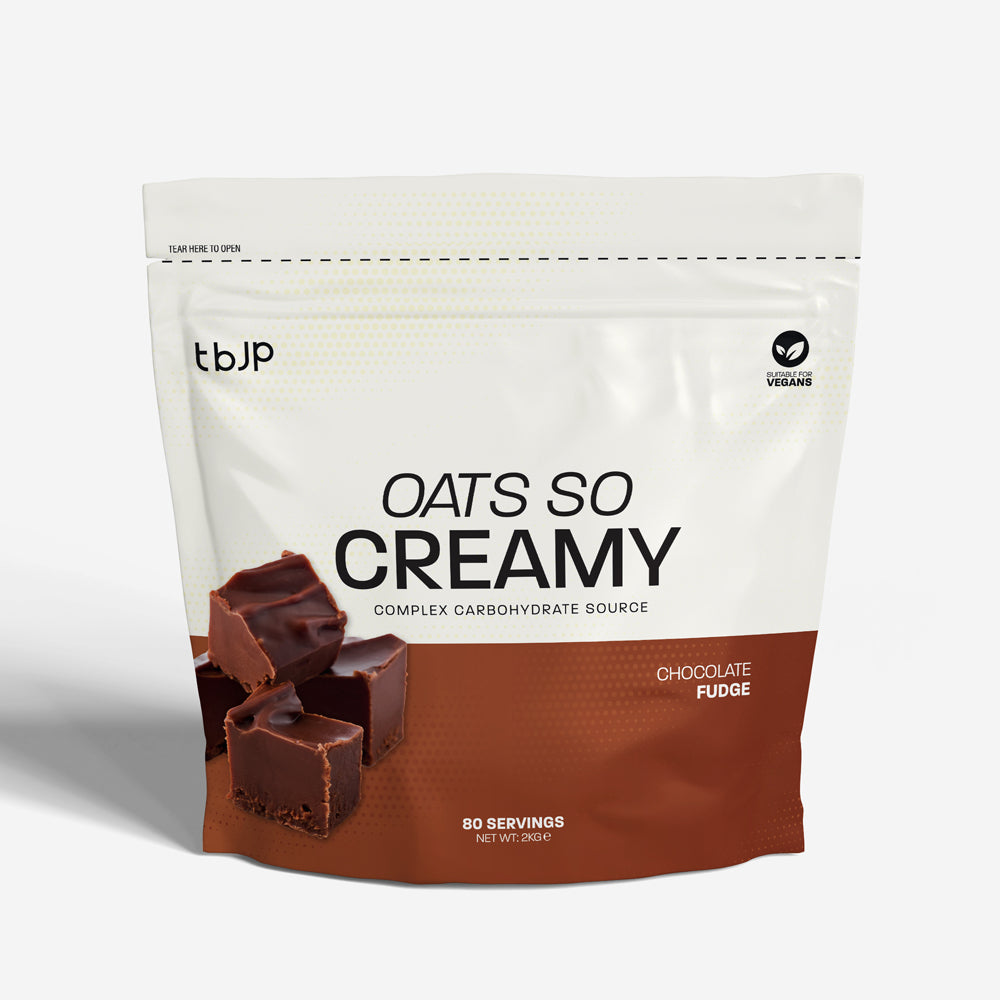 tBJP Oats So Creamy Chocolate Fudge powder, featuring a white and brown design with a photo of chocolate fudge cubes on the front, set against a light gray background.