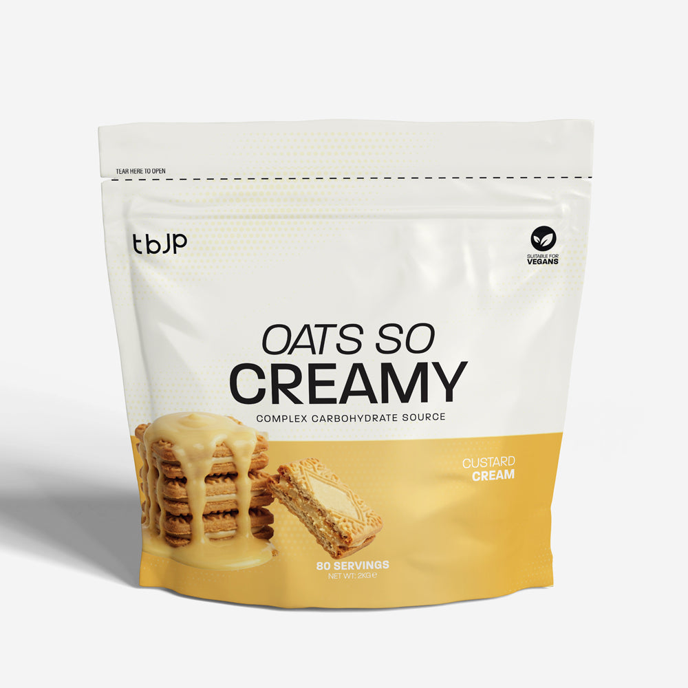 tbJP Oats So Creamy complex carbohydrate source in Custard Cream flavor, featuring a white and yellow design with an image of a creamy oatmeal stack on a light gray background.